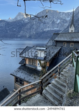 Similar – Image, Stock Photo Famous lake side view of Hallstatt village with Alps behind, Foliage leaves framed. Austria