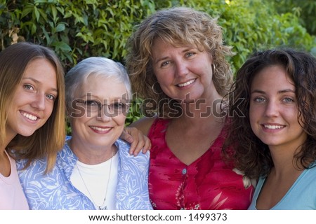 pretty women making up three generations of a family.