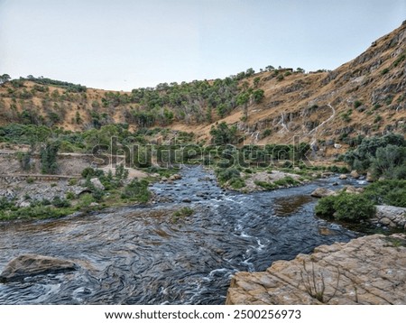 Image, Stock Photo A small river flowing through meadows and agricultural fields in April