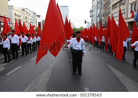 ISTANBUL, TURKEY - MAY 1: International Workers Day. Workers and socialist group walks on Sisli and Taxim on May 1, 2012 in Istanbul, Turkey
