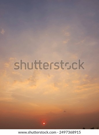 Similar – Foto Bild Dämmerstunde. Die Sonne geht hinter einer Baumgruppe, mit schönen Farben unter.