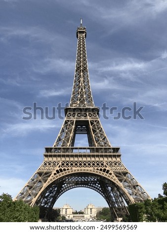 Similar – Image, Stock Photo Under the Eiffel Tower .  With light and shadow . Above me the Great Steel Frame . In the background a skyscraper and many trees.