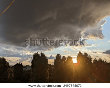 Similar – Image, Stock Photo Sunset behind dark clouds