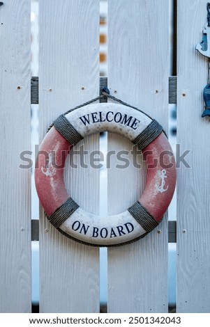 Similar – Image, Stock Photo Rubber ring on pier near lake