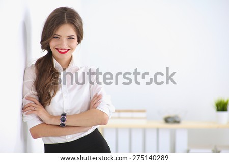 Similar – Image, Stock Photo Smiling businesswoman standing near gray wall