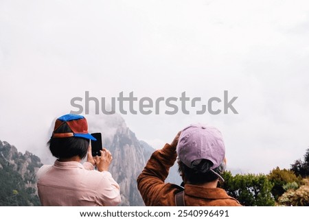 Image, Stock Photo Unrecognizable tourist admiring mountain and forest