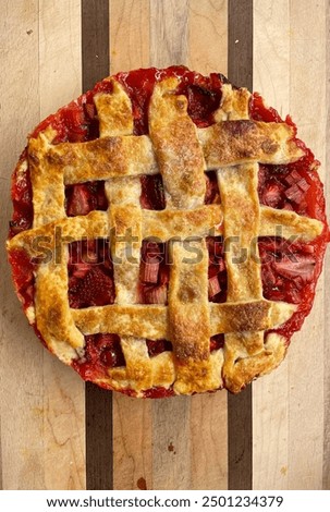 Image, Stock Photo Strawberry and rhubarb pie with a lattice crust. Fruits dessert