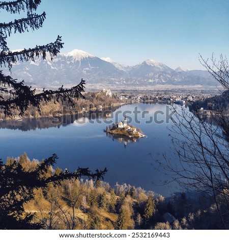 Similar – Image, Stock Photo Aerial view of Bled island on lake Bled, and Bled castle and mountains in background, Slovenia.