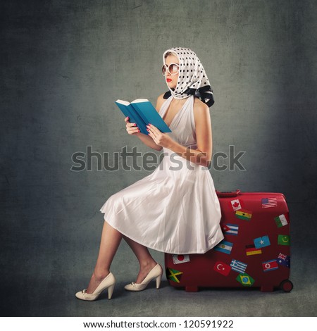 Retro woman with sunglasses and suitcase reading book portrait against vintage background.