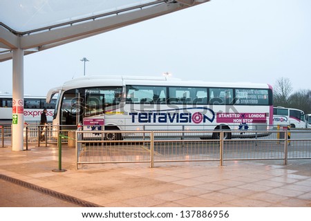 STANSTED, LONDON - APRIL 9: Terravision bus in Stansted airport. Terravision is an airport transfer company operating in Europe carrying around 10,000 travellers per day. April 9, 2013 in in London.