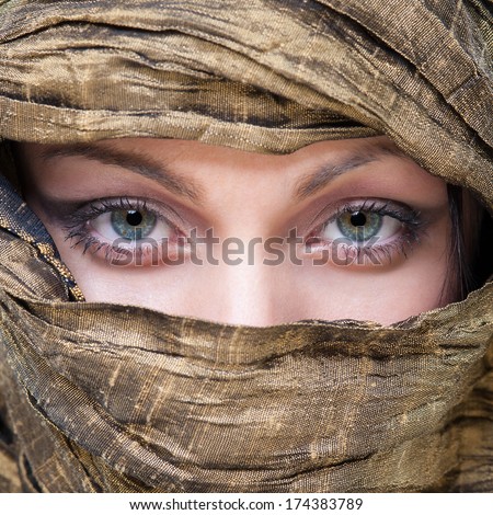 Portrait of veiled woman with beautiful eyes.
