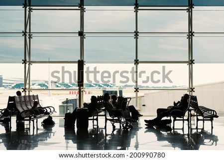 BARCELONA, SPAIN - MAY 30, 2014: Waiting room inside El Prat International Airport. The airport is the second largest in Spain and 31st busiest in the world, and is the main airport of Catalonia.