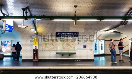 PARIS, FRANCE - MAY 17, 2014: Montparnasse Metro Station. The Paris Metro is a rapid transit system in the Metropolitan Area. It is mostly underground (214 kilometres) and has 303 stations.