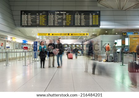 LISBON, PORTUGAL - JANUARY 6, 2014: People walking inside Lisbon airport. Portela Airport is an international airport in the city of Lisbon, it opened on 1942 and had reached 100,000 passengers.