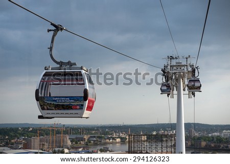 LONDON, UNITED KINGDOM - JUNE 2015: Emirates cable car. The service is London first urban cable car which crosses the Thames from Excel centre to the O2.