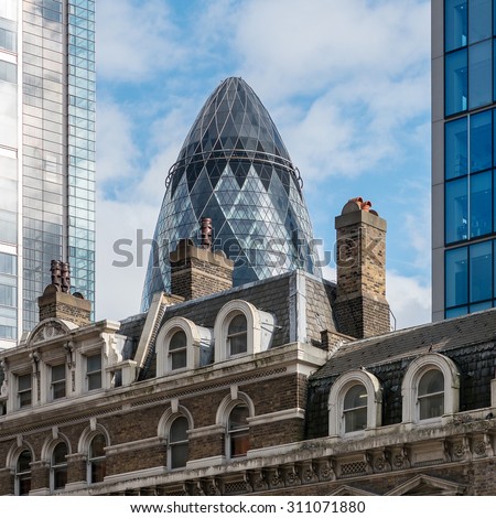 LONDON, UK - JUNE 17, 2015: Gherkin building. It has become an iconic symbol of London and is one of the city\'s most widely recognised examples of modern architecture.