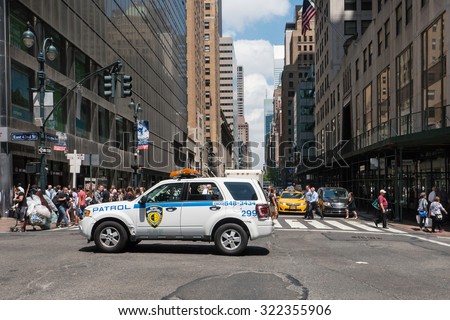 NEW YORK CITY - MAY 11, 2015: NYPD Police car on 42nd street. The New York City Police Department, established in 1845, is the largest municipal police force in the United States. Stock video