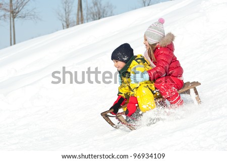 Similar – Foto Bild Junge mit rotem Schlitten im Schnee