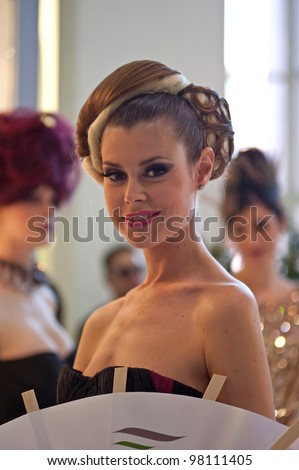 BOLOGNA, ITALY - MARCH 12: Hairstyle at Cosmoprof exhibition, the largest beauty and cosmetic sector trade show in Italy with more than 170.000 attendees on March 12, 2012 in Bologna, Italy.