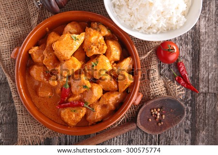 curry chicken with sauce and rice