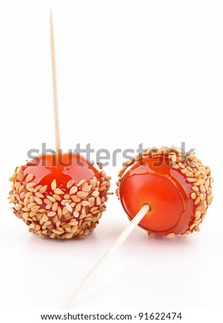 isolated cherry tomato like toffee apple