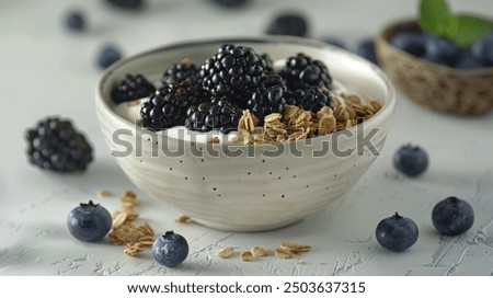 Similar – Foto Bild Leckere Frühstücksschüssel mit Quinoa, Reis und Grütze in der Nähe von Teetasse und Zeitung