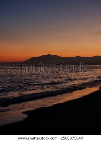 Similar – Image, Stock Photo Red sunset with calm sea in the Mediterranean