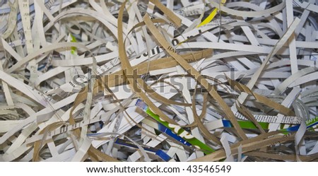 pieces of confidential paperwork, shredded to help protect against identity theft