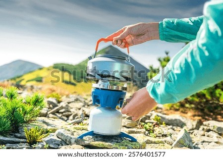 Similar – Image, Stock Photo Kettle placed on campfires in snowy woods at sundown