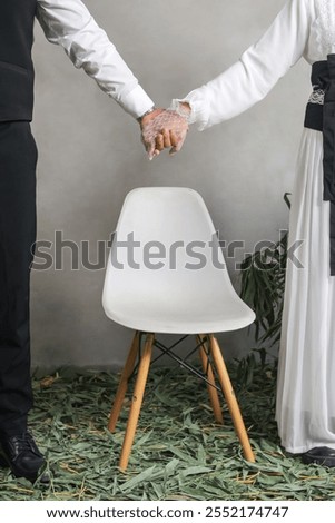 Similar – Image, Stock Photo Two hands put leaves into a fast foaming flowing river.