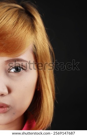 Similar – Image, Stock Photo Young blonde asian woman in knitted turtleneck sweater with fairy lights and bokeh around