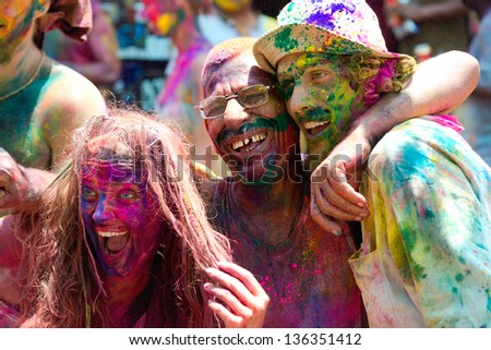 ARAMBOL, GOA - MARCH 27: Unidentified people celebrate Holi festival in Arambol Main Street, GOA, India on March 27, 2013. It\'s a religious spring holiday and also known as Festival of Colours.