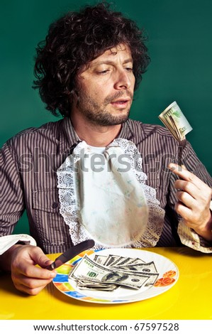 Rich Man eating dollars