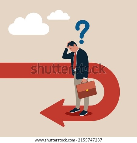 Frustrated businessman investor looking at his reverse direction pathway. Business turning point, break event or change direction, reverse back, interest rate or financial trend change concept.