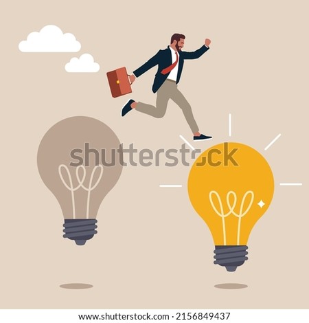 Smart businessman jump from old to new shiny lightbulb idea. Business transformation, change management or transition to better innovative company, improvement and adaptation to new normal concept.