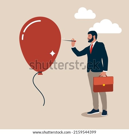Businessman pushing needle to pop the balloon. Business concept