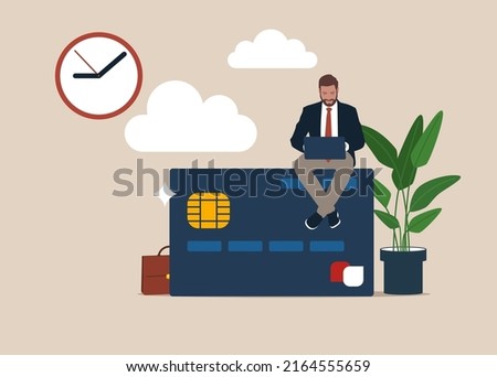 Credit card or contactless payment business. Vector flat illustration of man using computer laptop sitting on top of a credit card shopping online. 