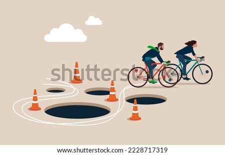 Business Team with Bicycle  pass many pitfalls to achieve business success. Avoid pitfall, adversity and brave to around pass mistake or business failure, skill and creativity to solve problem concept