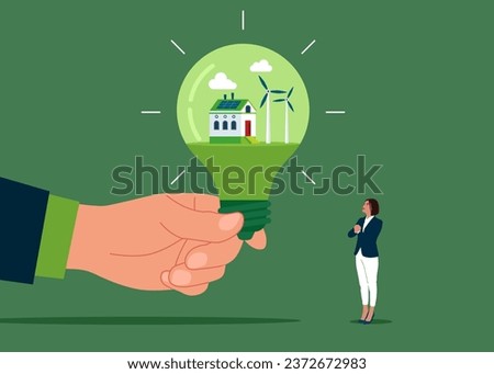 Hand hold home with and clean energy windmill on Light bulb. Green energy technology. Flat vector illustration. 
