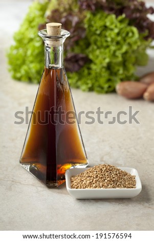 Sesame oil and roasted sesame seeds to use for a dressing