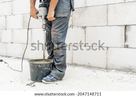 Similar – Image, Stock Photo Male worker using electric grinder in workshop