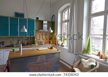 modern kitchen in a single-family house. with large windows spending a lot of daylight.
