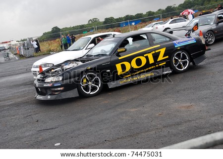 NORTHANTS, ENGLAND - AUG 2: Black Nissan Dotz Drift Car on display at the Annual Ultimate Street Car Show on August 2, 2008 in Northants, England, UK. Santa Pod is host to the show