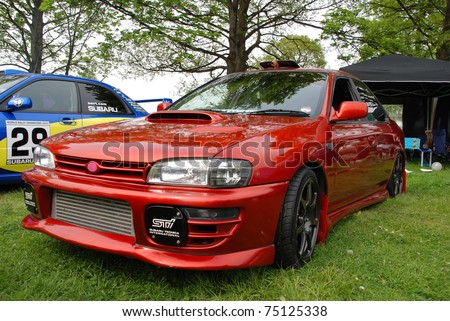 WAKEFIELD, ENGLAND - MAY 10: Red Subaru Impreza on Display at the Annual Rising Sun Car Show on May 10, 2008 in Wakefield, England, UK.  Norton Priory is host to the show