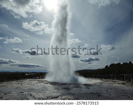 Image, Stock Photo Large geyser on Iceland surrounded by lava cliffs