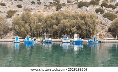 Similar – Image, Stock Photo Boat floating in calm sea water