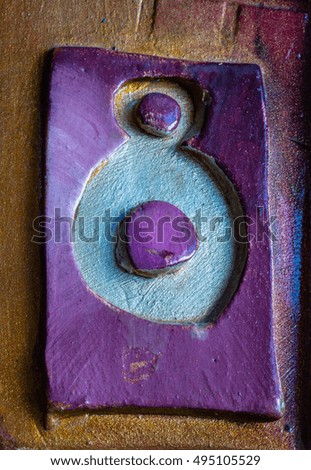 Image, Stock Photo old, purple-blue, enamelled street sign ” Friedensplatz ” on a beige-coloured house wall next to a white window with stone cornice and green plants behind the glass pane, in which a tree is also reflected / street name