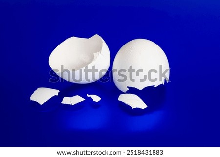 Similar – Image, Stock Photo Egg shells on a cream-coloured background. Kitchen concept.