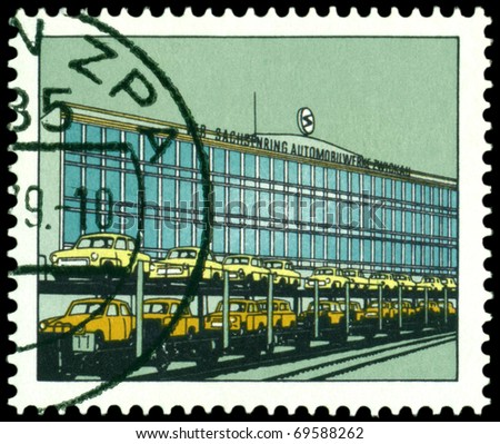 GDR - CIRCA 1979: A stamp printed in the GDR shows building of the automobile factory in Zwickau, series, circa 1979