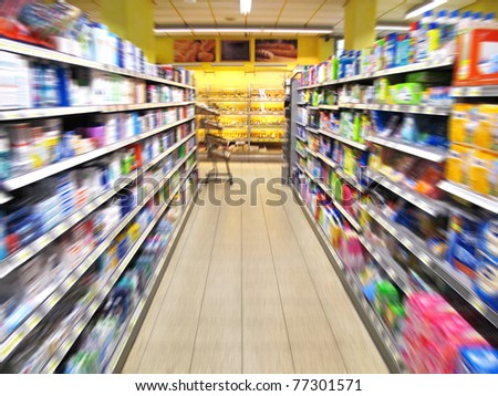 aisle of a supermarket with blurred motion